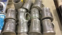 11 pewter beer mugs, different designs, several