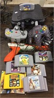 Nintendo 64 game player with 2 controllers & 8