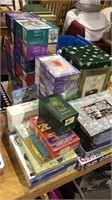 Group lot of mostly puzzles, tub of large size