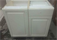 Off white lower 2 door 1 drawer cabinet. 35x36x25