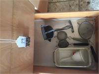 strainers, kitchen towels, contents of
