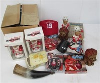 Powder horn and various Detroit Red Wings bobble