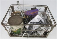 Wire dairy crate with contents that includes