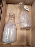 Two Arshamomaque Dairy farms milk bottles