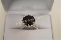 LADIES STERLING SILVER AND RED GARNET RING