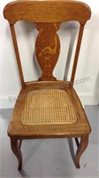 Oak wood chair with cane seat