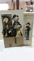 2 doll carolers with boxes