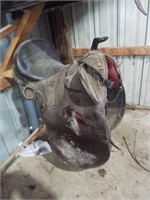 Western style saddle with 14" seat.