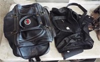 (2) Leather duffle bags.