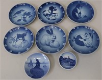 Eight Royal Copenhagen plates 15cm dia