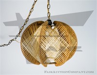 A vintage woven hanging lamp