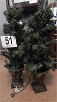 TWO PRE LIT ARTIFICIAL CHRISTMAS TREES IN POTS 34