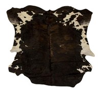 LARGE TANNED DARK BROWN AND WHITE COW HIDE