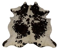 LARGE TANNED DARK BROWN, BLACK, AND WHITE COW HIDE