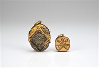 Two antique lockets