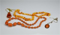 Lot of amber and faux amber jewellery