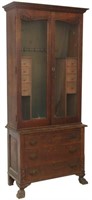 The Holt Carved Oak Step Back 2 Dr. Gun Cabinet