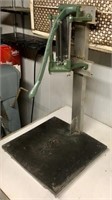 french fry cutter mounted on stand