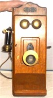 AN OLD WALL MOUNT HAND CRANK TELEPHONE
