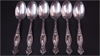 Six sterling silver serving spoons,
