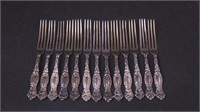 13 sterling silver berry forks,