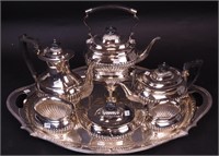 A six-piece silverplate tea set including