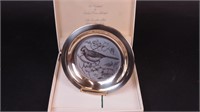 A silver 8" plate marked sterling, The Cardinal
