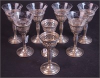 Eight 4 1/2" sterling liqueur glasses with