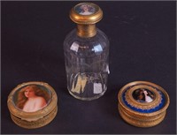 An etched crystal perfume bottle with