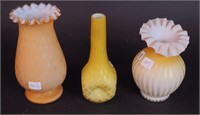 Three pieces of yellow-to-cream cased glass