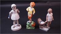 Three decorative figurines including