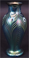 An 8" peacock art glass vase signed