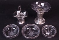 Three nesting etched glass bowls with