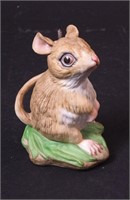 A porcelain figurine of deer mouse, 3 1/2" high,