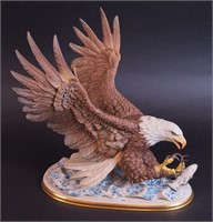 A Boehm Millennium porcelain eagle figurine,