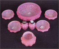 Eight pieces of pink glass including