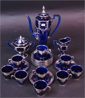 A 21-piece set of navy blue Lenox china