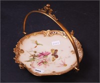 A Royal Worcester nappie, 6" wide, decorated with