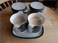 Eleven Pieces Poole Iron Stone Cookware