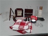 Paul Sebastian clock, photo holder, table cloths +