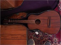 Lot #163 - Antique guitar in case with damage
