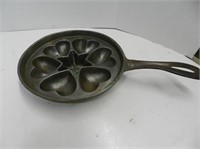 Cast iron pan with heart & star mold