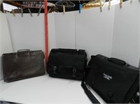 3 brief cases 1 leather, 2 cloth