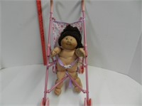 Vintage Cabbage Patch doll with stroller