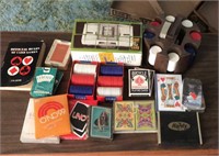 Large lot of playing cards and poker chips