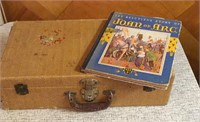Vintage suitcase and Joan of Arc book