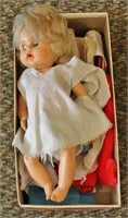 DOLL MARKED "REGAL CANADA" WITH BOX OF CLOTHES