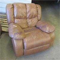 Leather over stuffed rocking chair