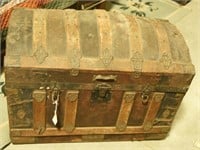 Lot #271 Dome top steamer trunk. Missing Insert.