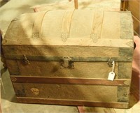 Lot #253 Dome top steamer trunk with insert.